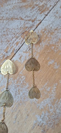 ARON ,pendientes dorados .